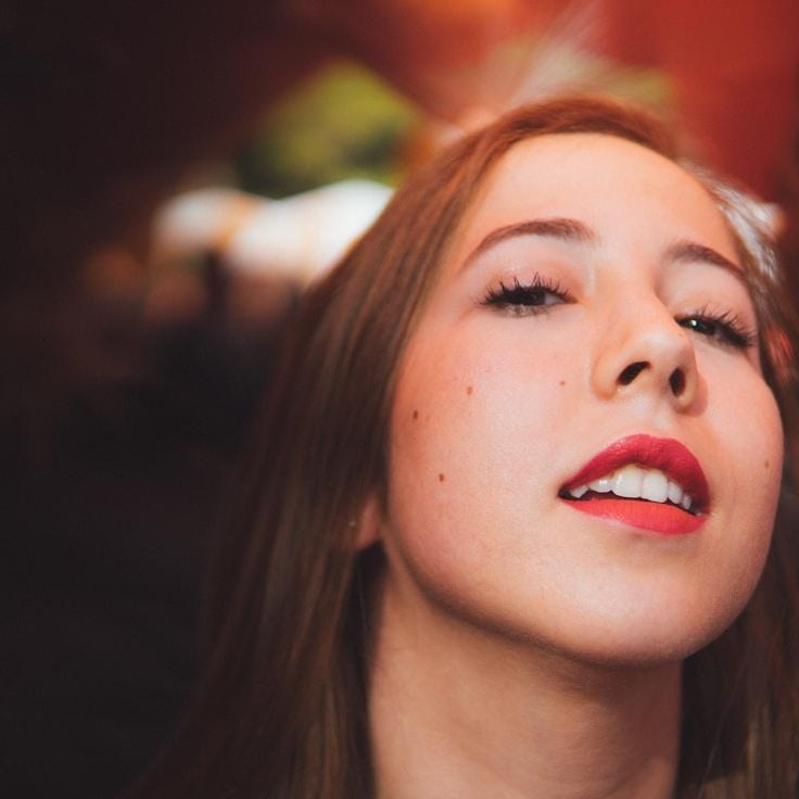 Alex Rivera, Lead Design Curator at CyPressFieldLab, reviewing corporate floral arrangements
